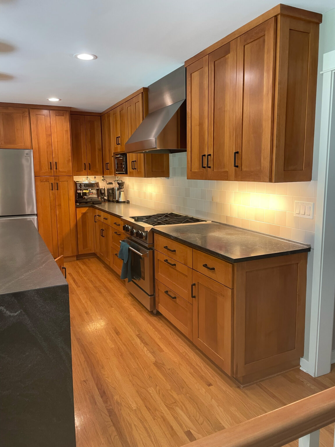 Before and after kitchen cabinet transformation showing dramatic results